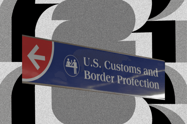 Sign reading “U.S. Customs and Border Protection” with an arrow pointing left, indicating airport border control.